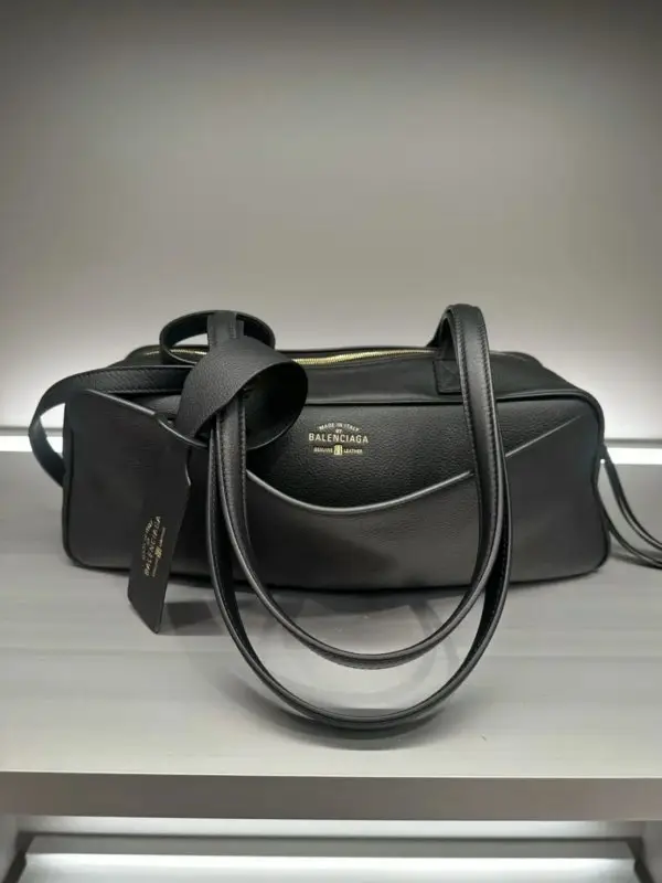 Balenciaga — A bag leather Carrie Bowling 32 cm