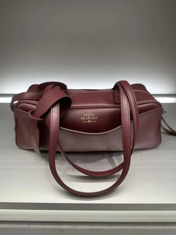 Balenciaga — A bag leather Carrie Bowling 32 cm