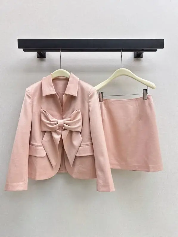 Chanel — Blazer from big bow and skirt A-silhouette