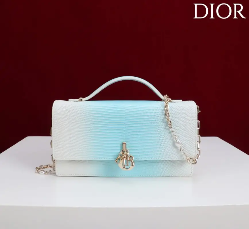 Christian Dior — A bag Lady Dior Flap Chain Clutch 21 cm