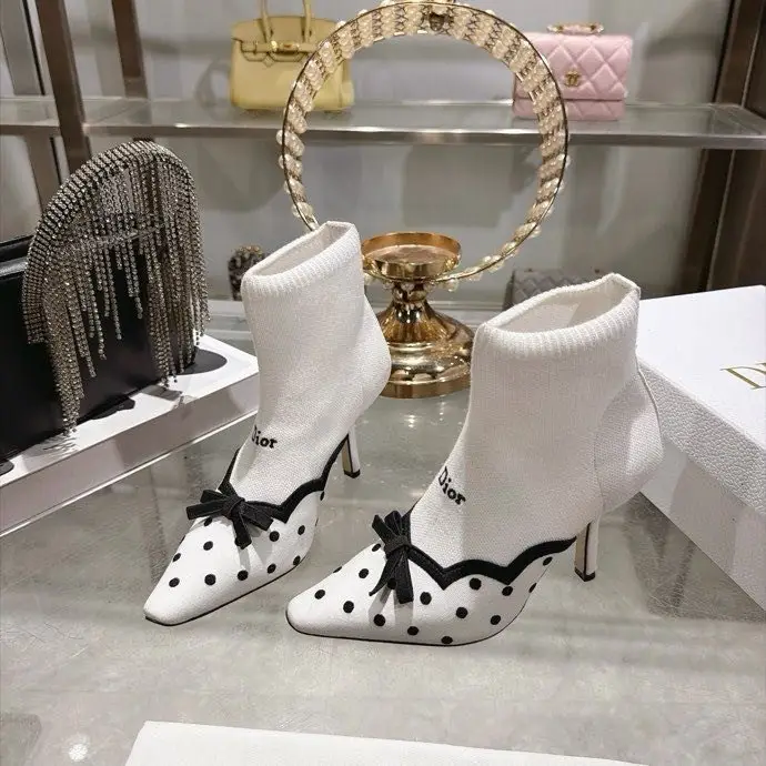 Christian Dior — Ankle boots on stud