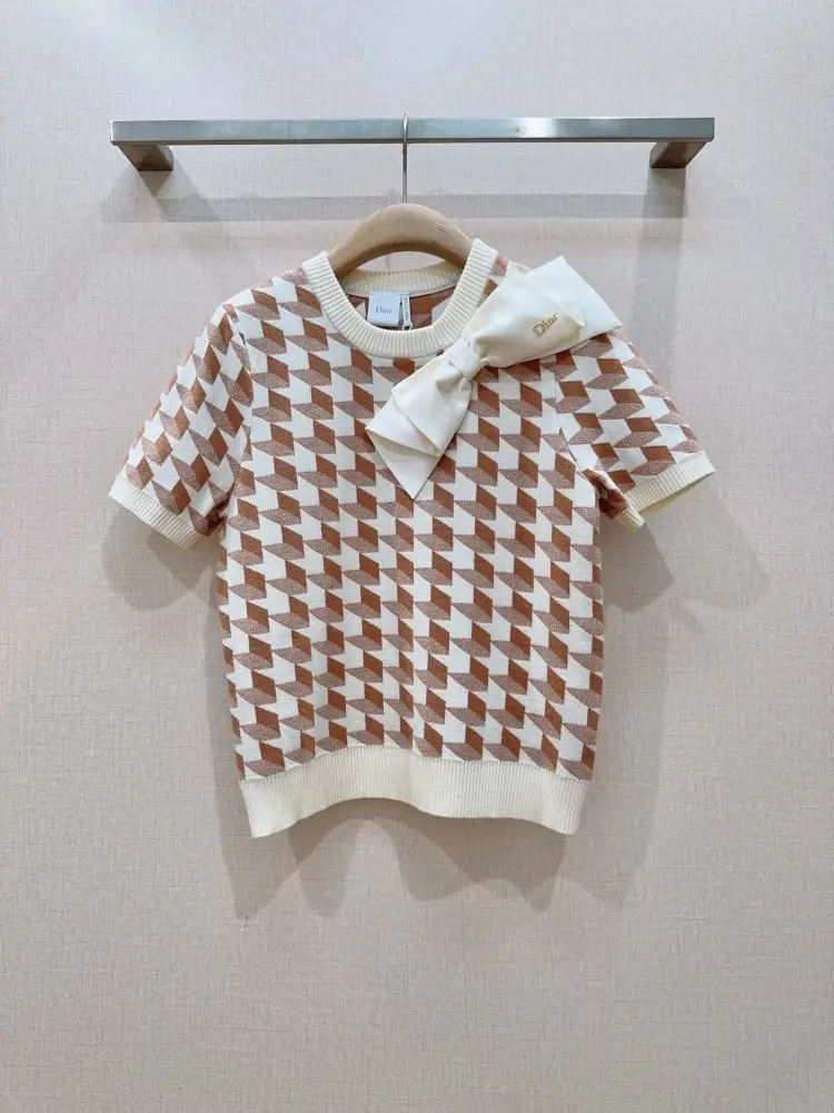 Christian Dior — Knitted pullover female from short sleeves at cell