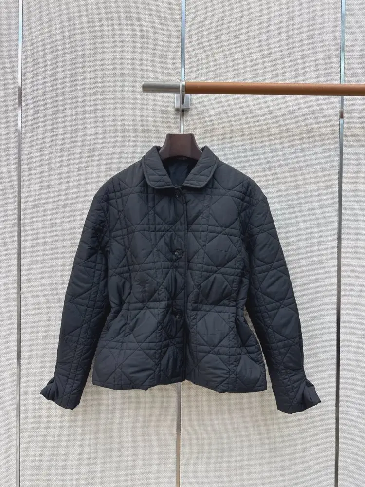 Christian Dior — Winter jacket from strings on waist and quilted the bottom
