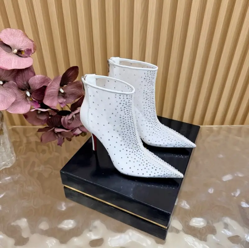 Christian Louboutin — Ботильйони на шпильці
