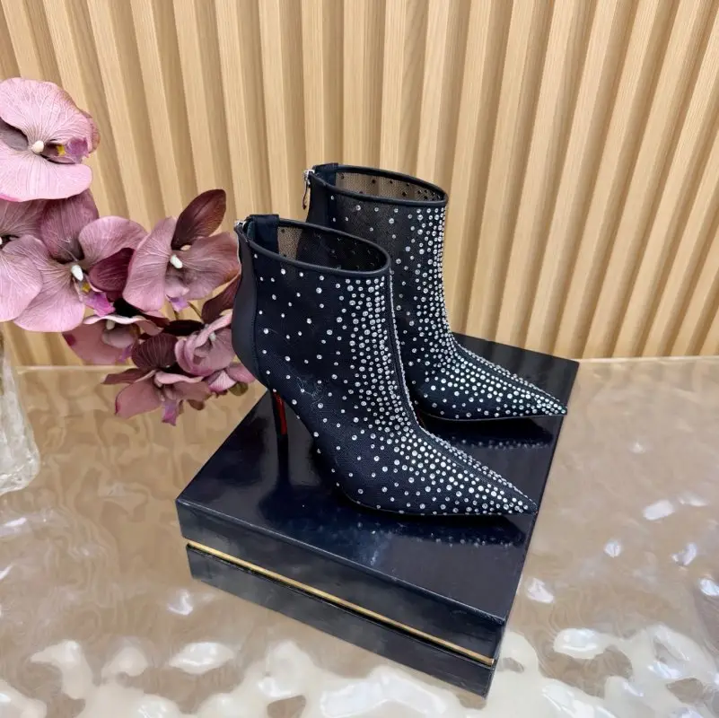 Christian Louboutin — Ankle boots on stud