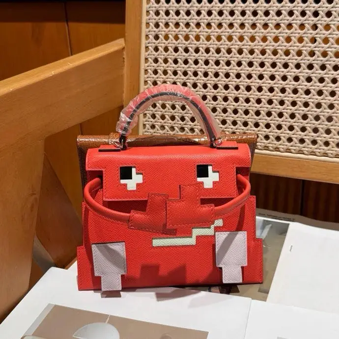 Hermes — A bag Kelly Doll 20 cm at skin Epsom
