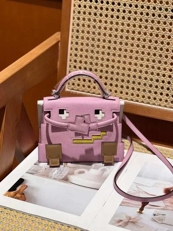 Hermes — A bag Kelly Doll 20 cm at skin Epsom