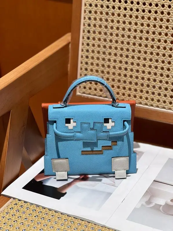 Hermes — A bag Kelly Doll 20 cm at skin Epsom