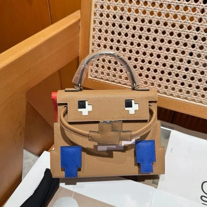 Hermes — A bag Kelly Doll 20 cm at skin Epsom