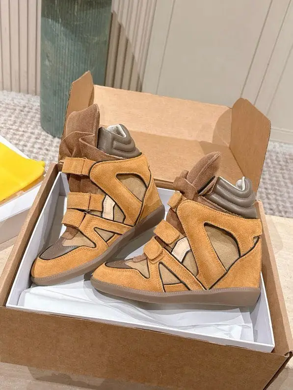 Isabel Marant — Стильні кросівки на танкетці