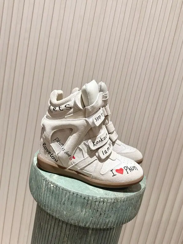 Isabel Marant — Стильні кросівки на танкетці