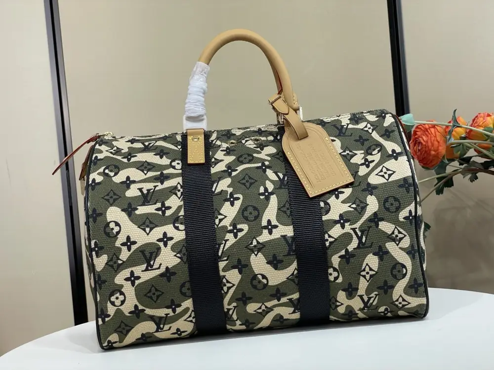 Louis Vuitton — Сумка дорожняя Keepall Bandoulière 35