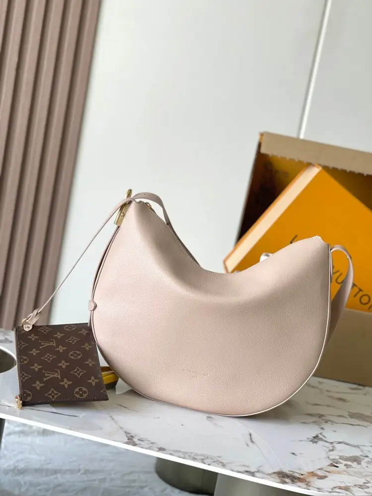Louis Vuitton — A bag Low Key Cookie leather 32 cm