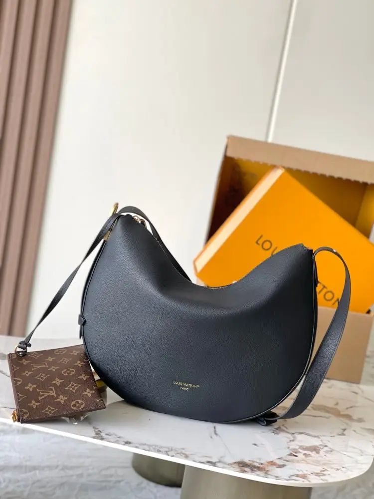 Louis Vuitton — A bag Low Key Cookie leather 32 cm
