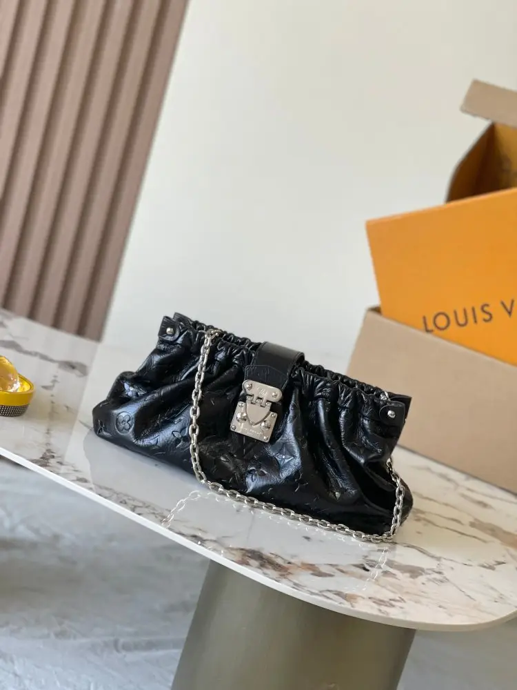 Louis Vuitton — A bag POCHETTE SLING30 cm