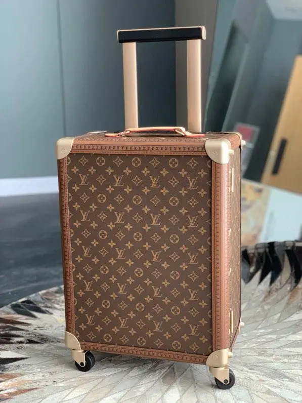 Louis Vuitton — Suitcase Rolling Trunk for manual luggage 39 x 55 x 21 cm