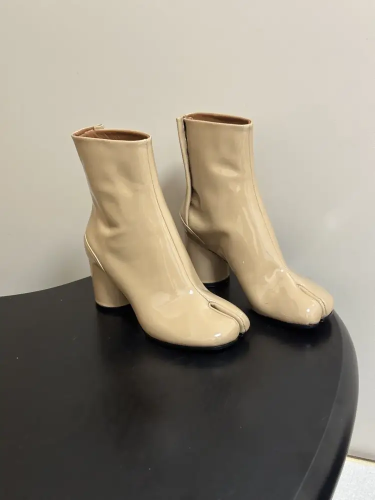 Maison Margiela MM6 — Ankle boots from split the toe and massive heel