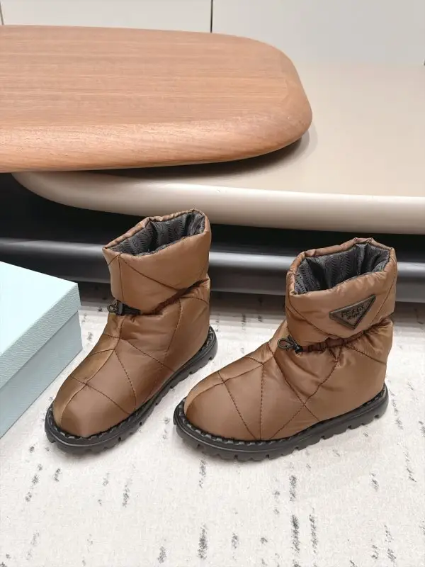 Prada — Ugg boots on feathers