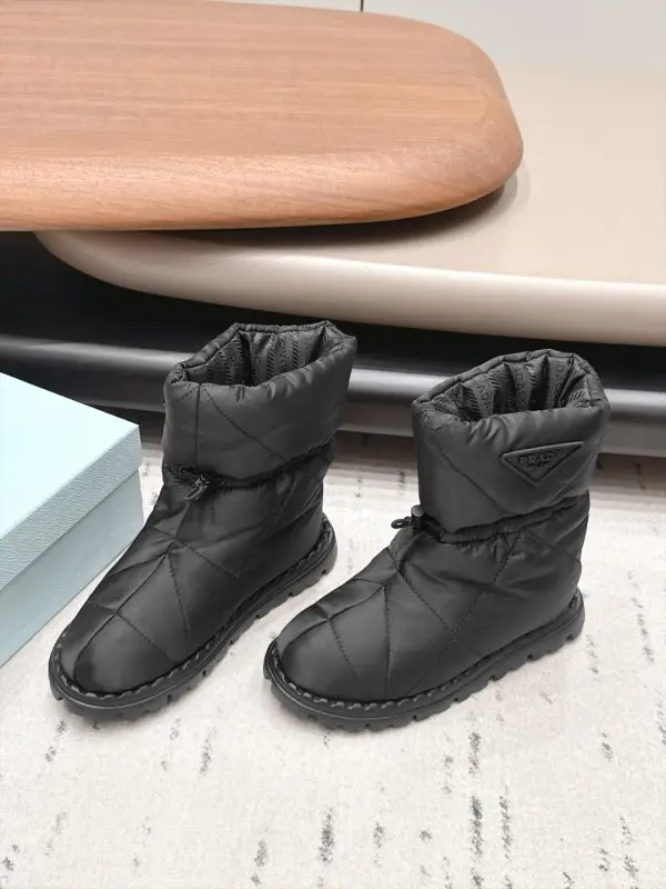 Prada — Ugg boots on feathers