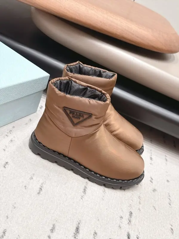 Prada — Ugg boots on feathers