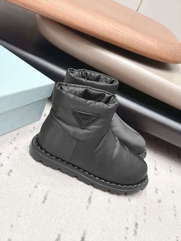 Prada — Ugg boots on feathers
