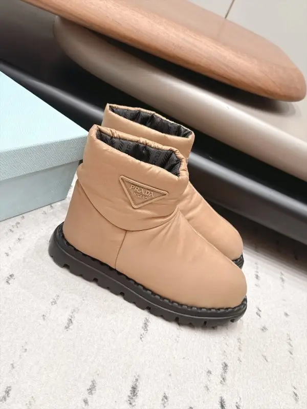 Prada — Ugg boots on feathers
