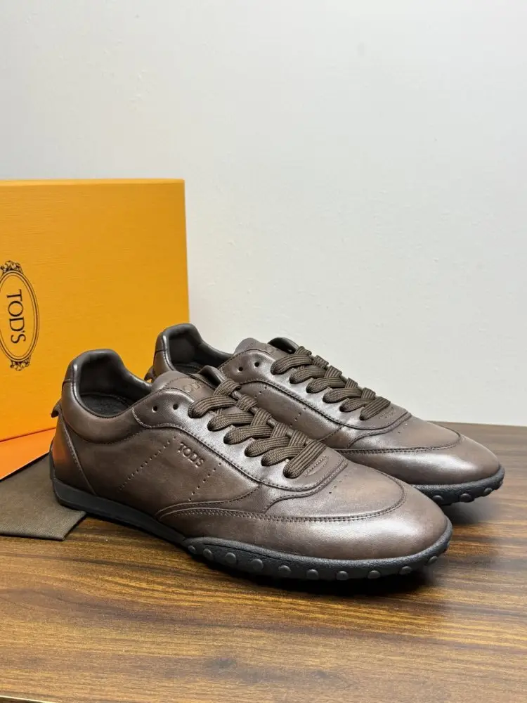 TODS Кроссовки мужские — Фото 1