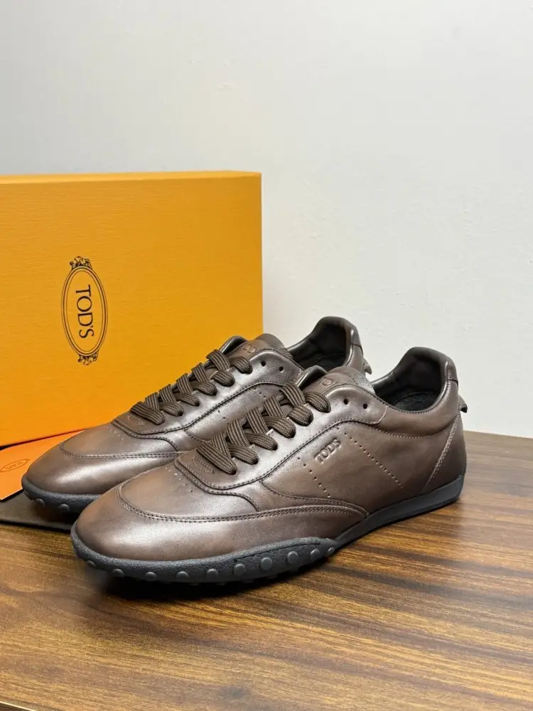 TODS Кроссовки мужские — Фото 4