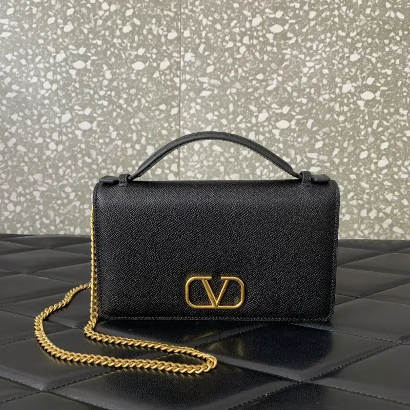 Valentino — A bag Valenté Garavani VRING from chain